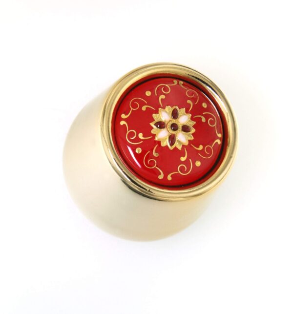 Bouchon a champagne metal dore avec emaux bressans rouge cerise